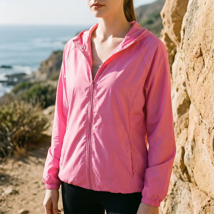 Women's lightweight hooded active jacket, perfect for outdoor activities & athletic wear. Water repellent windbreaker.