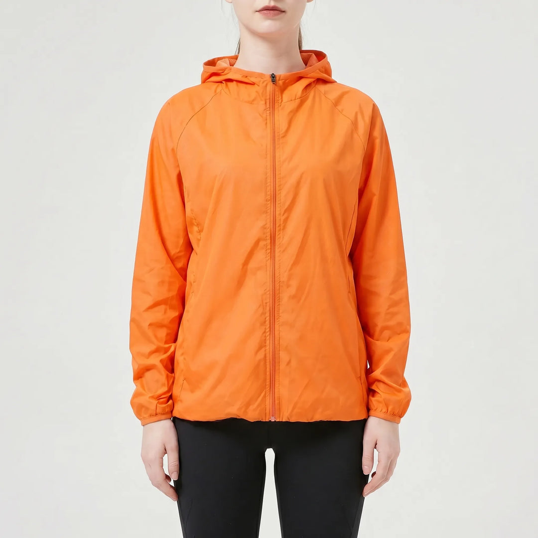 Spring women's hooded jacket. Lightweight, packable windbreaker, perfect for transitional weather & active travel.