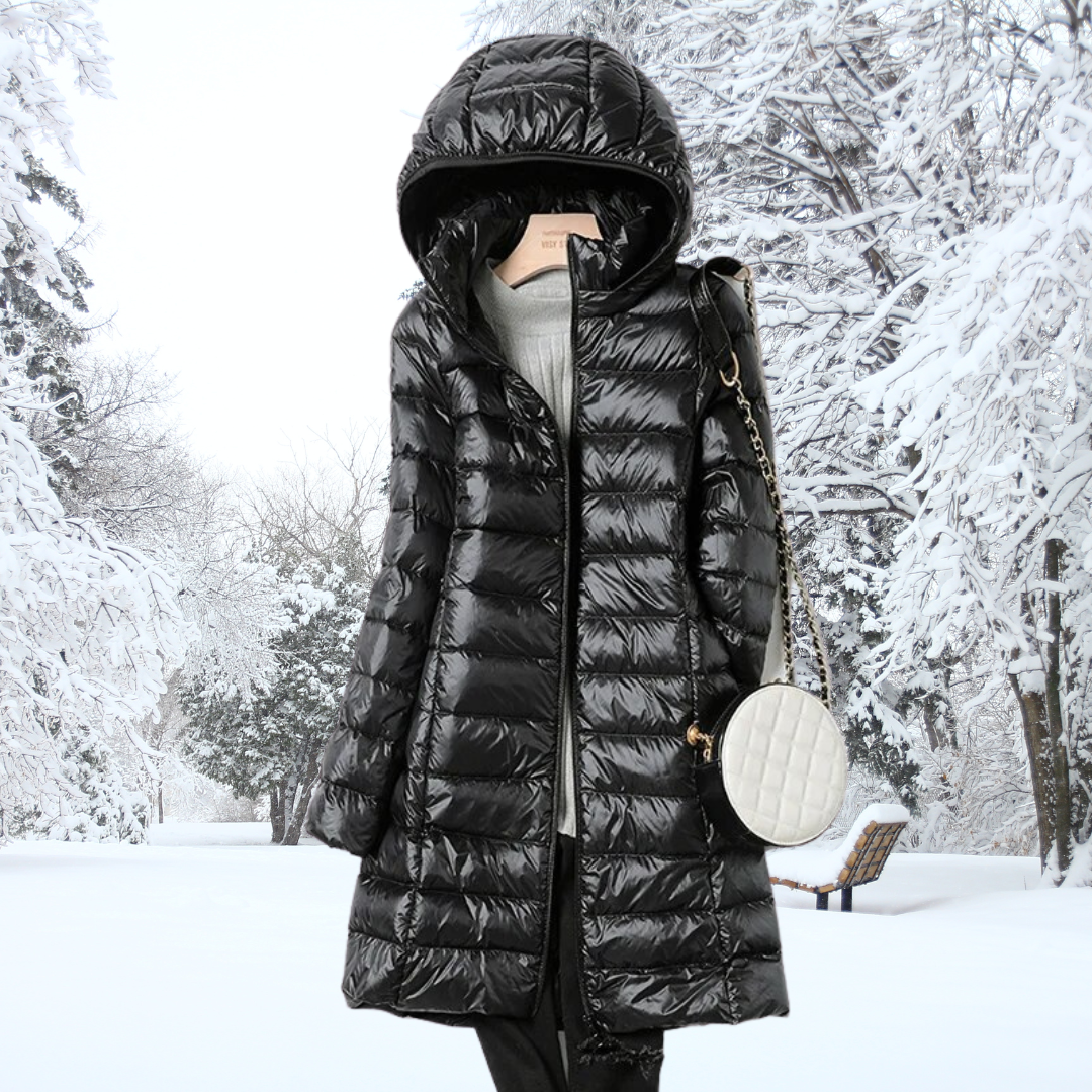 Women's lightweight insulated hooded puffer jacket, a practical and stylish choice for cold weather.