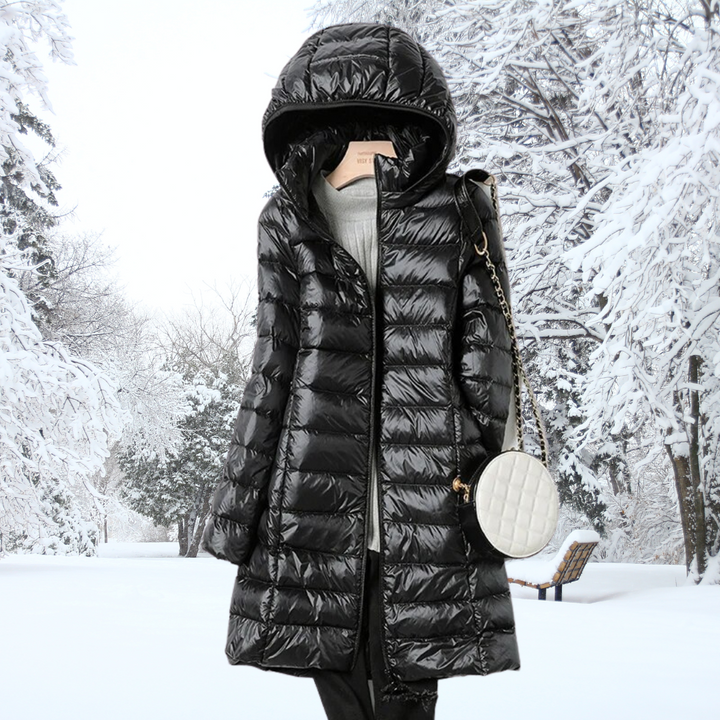 Women's lightweight insulated hooded puffer jacket, a practical and stylish choice for cold weather.