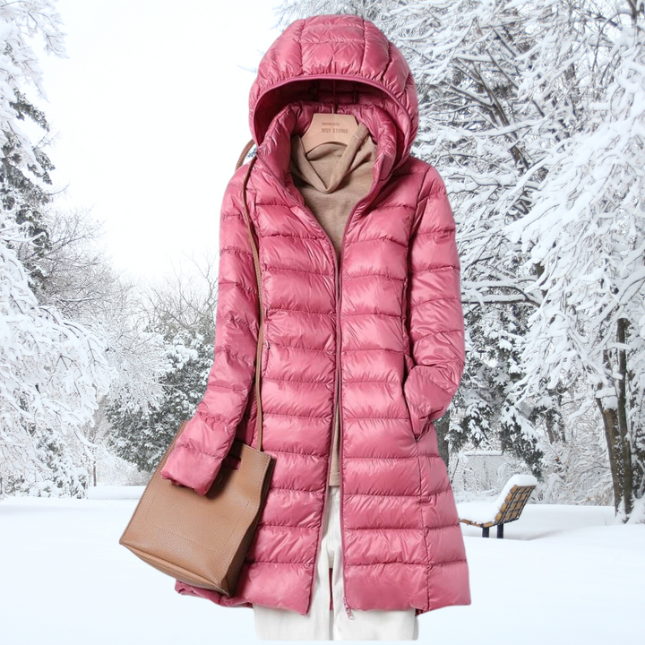 Travel-friendly women's lightweight puffer jacket with hood. Insulated, great for fall & mild winter.