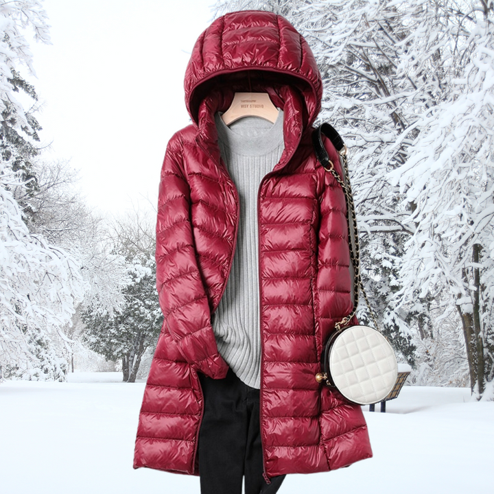 Lightweight women's insulated puffer jacket with hood. Easy to pack, perfect for fall & mild winter.