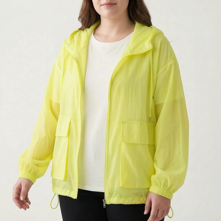 Women's athletic windbreaker jacket, hooded & lightweight, suitable for running & fitness.