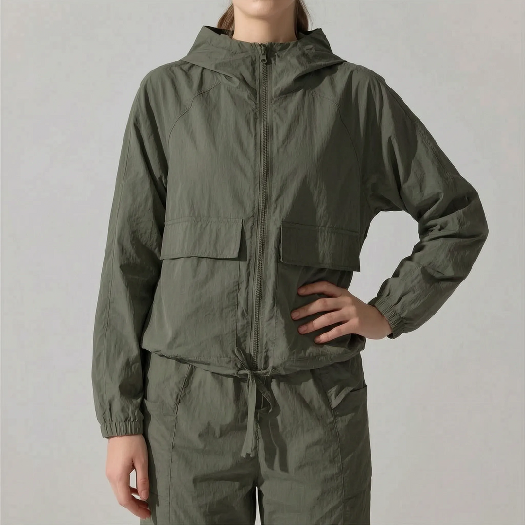 Women's outdoor hooded jacket, lightweight & durable. Perfect athletic windbreaker for hiking, running, and active sports.