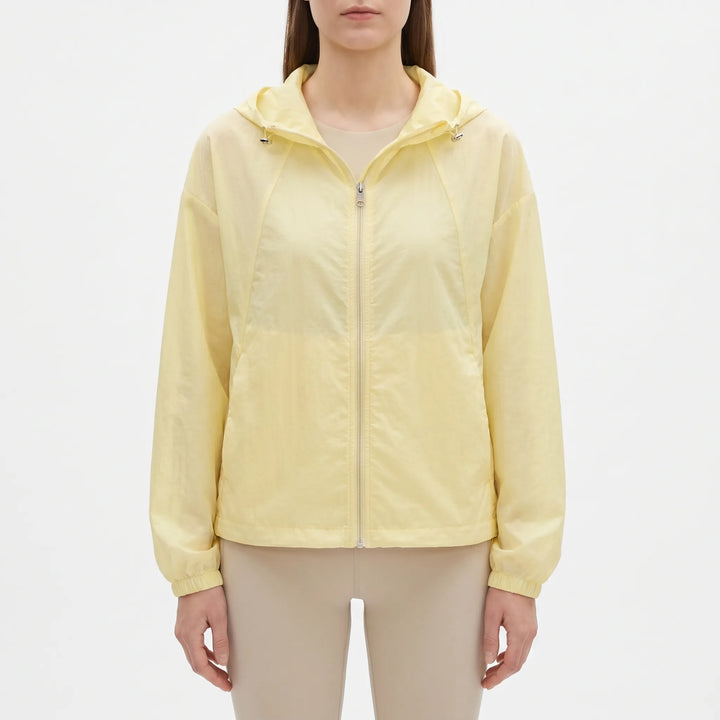 Stylish women's hooded windbreaker, an ideal lightweight outerwear choice for breezy spring & summer days.