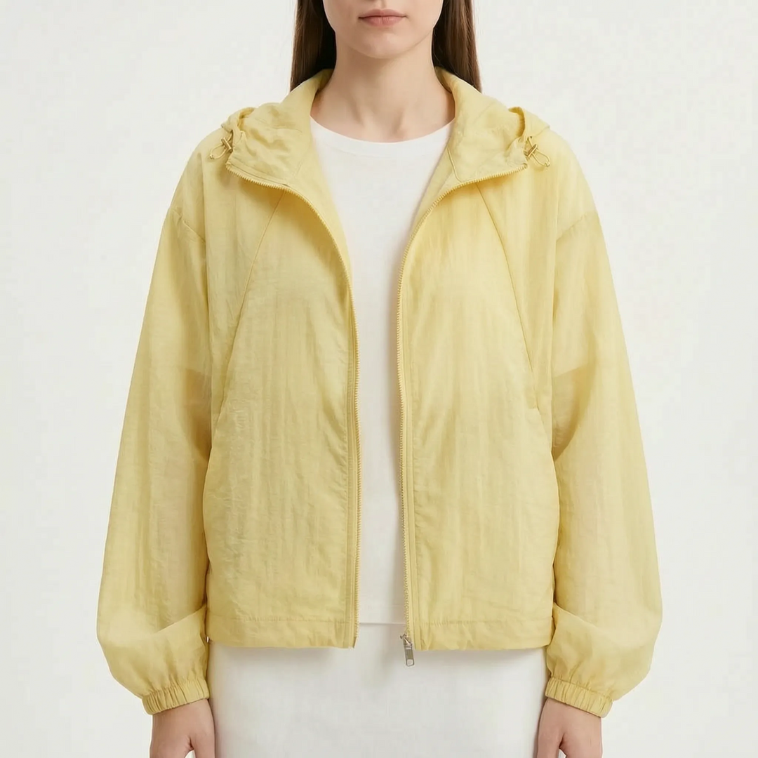 Comfortable women's lightweight hooded windbreaker, perfect for cool spring & summer evenings.