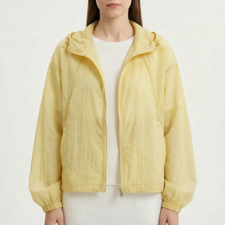 Comfortable women's lightweight hooded windbreaker, perfect for cool spring & summer evenings.