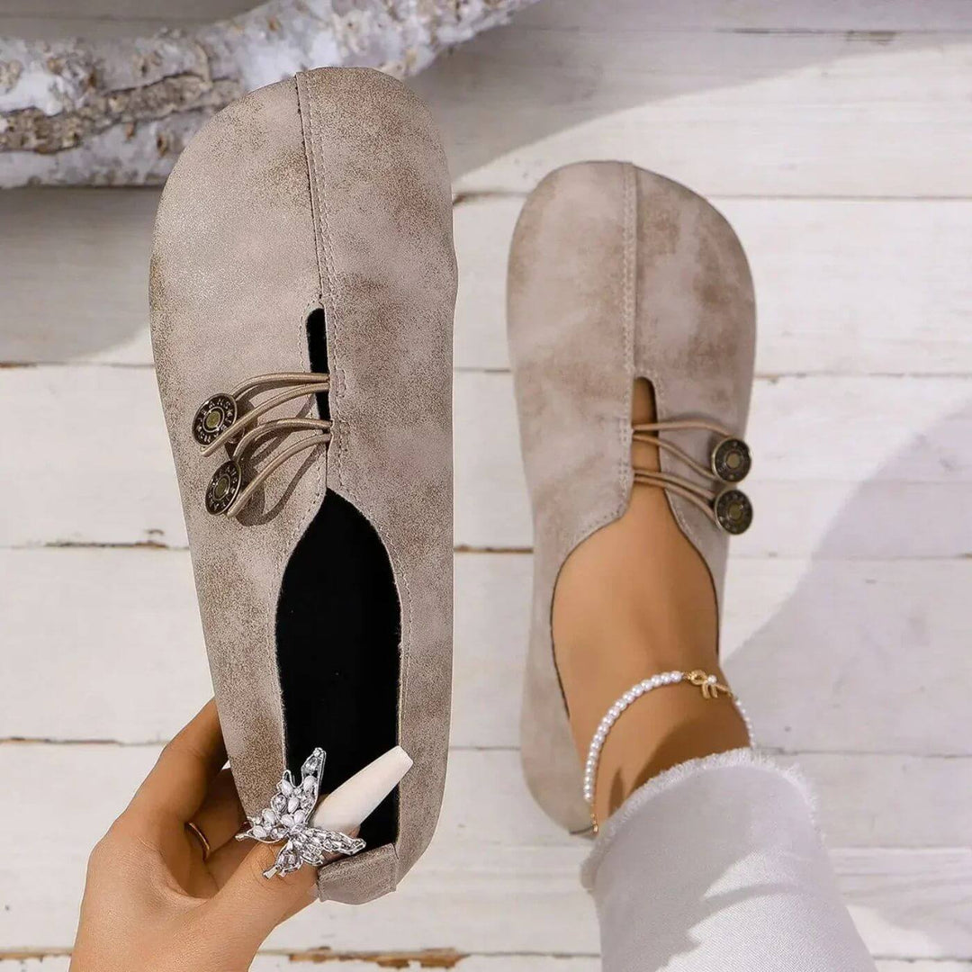 Supportive orthopedic women's flats, ideal for all-day comfort.