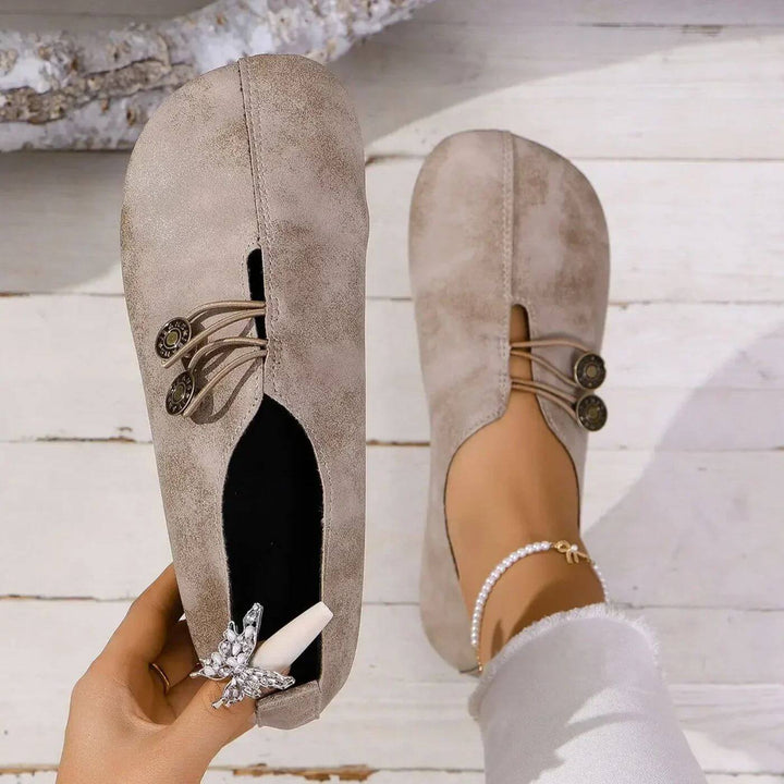 Supportive orthopedic women's flats, ideal for all-day comfort.