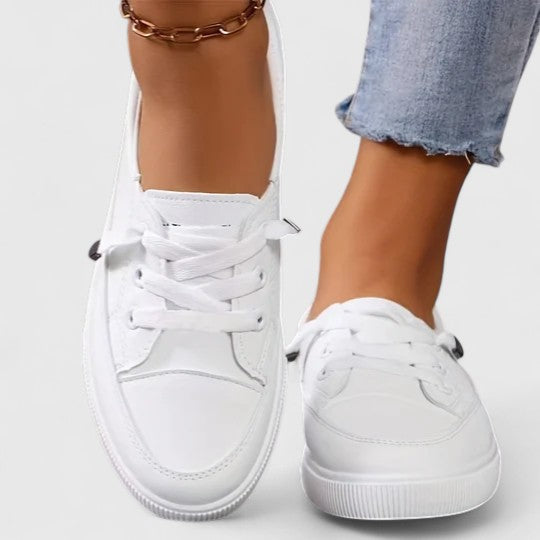 Comfortable women's orthopedic walking shoes, lightweight & breathable, offering arch support for daily wear.