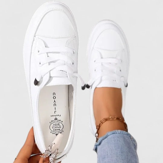Lightweight women's orthopedic walking sneakers. Breathable, comfortable, & supportive for everyday wear.