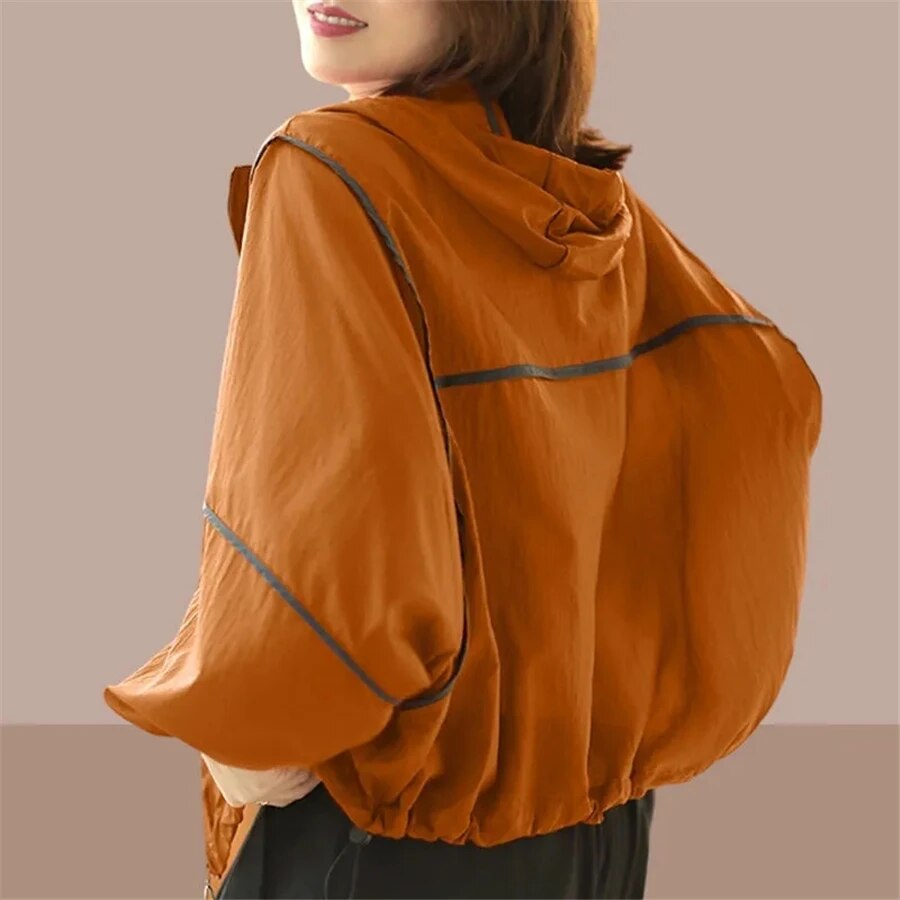 Women's lightweight oversized summer hoodie jacket in a neutral tone, perfect for casual layering.