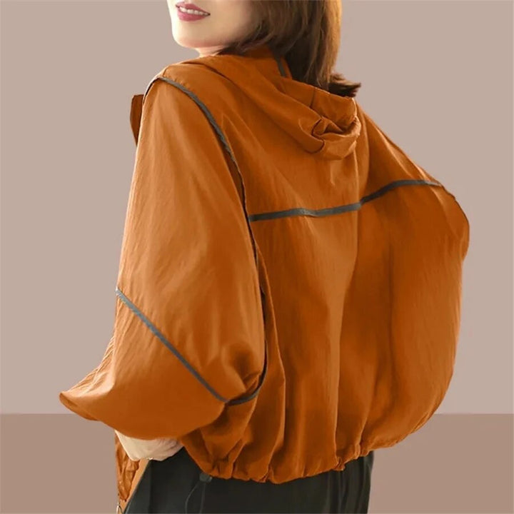 Women's lightweight oversized summer hoodie jacket in a neutral tone, perfect for casual layering.