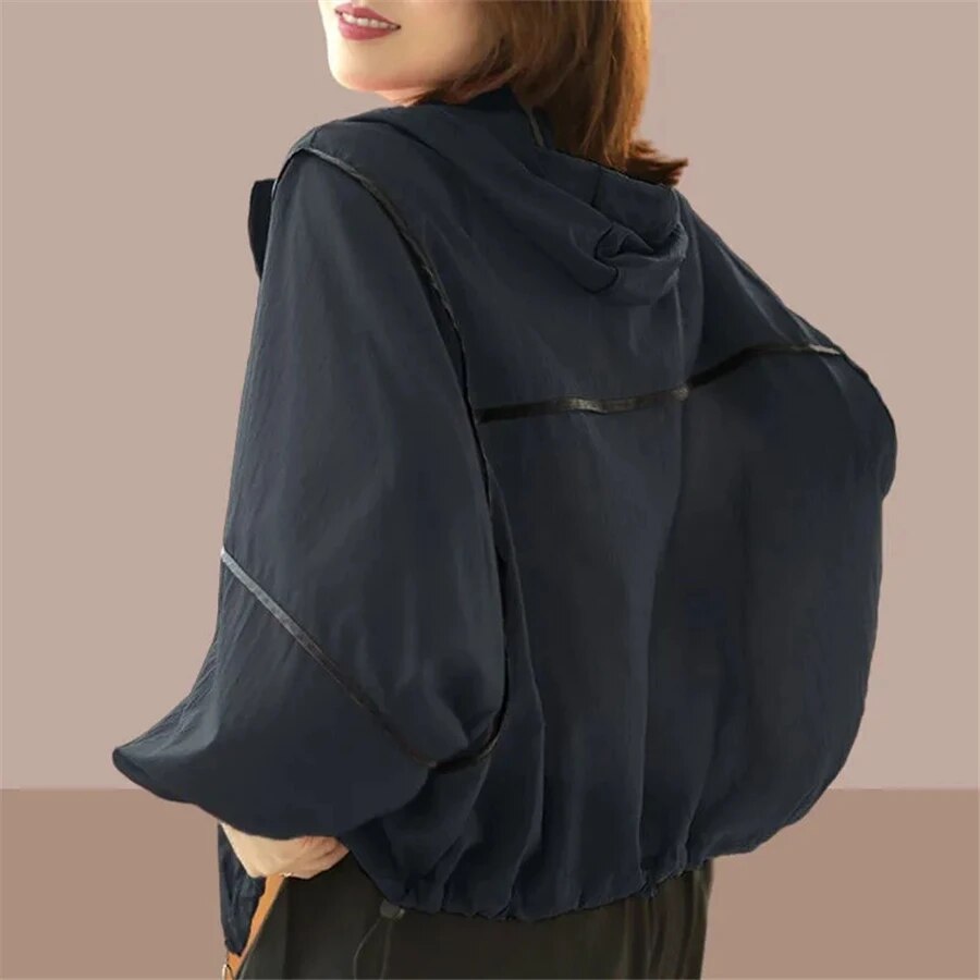 Trendy women's lightweight summer jacket with an oversized fit, ideal for casual everyday style or travel.