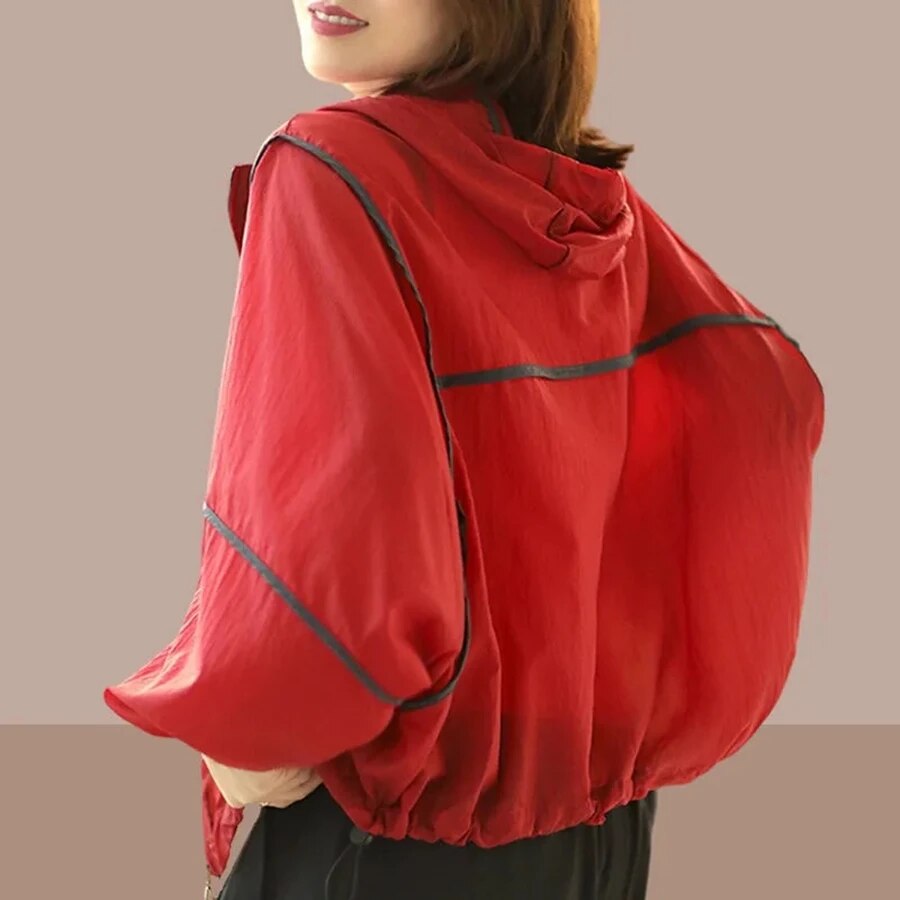 Comfortable women's lightweight oversized zip hoodie, perfect for spring/summer layering & travel wear.