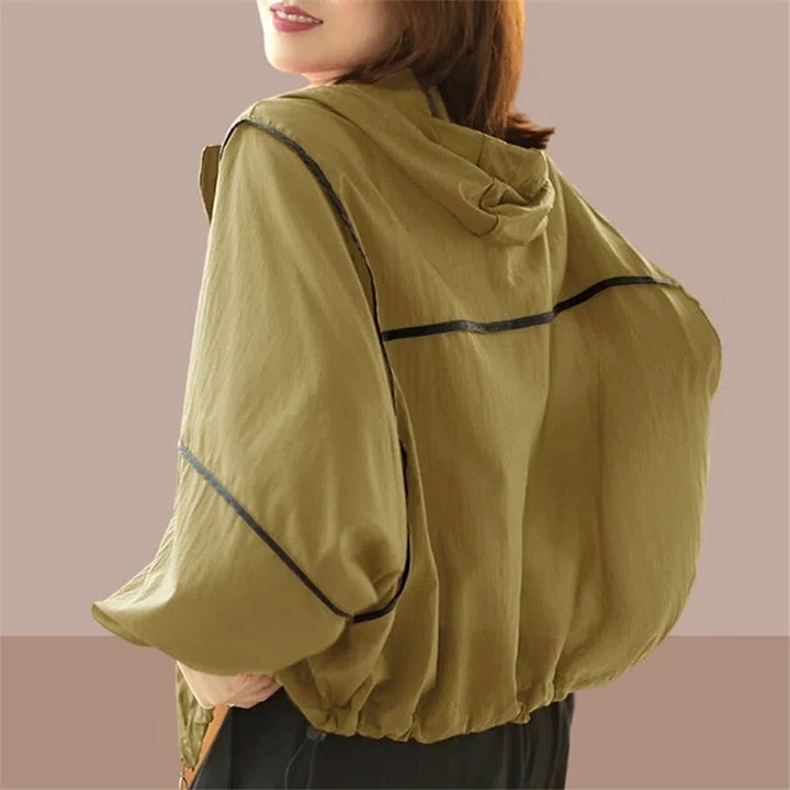 Casual women's oversized summer hoodie jacket. Lightweight & loose-fitting, great for warm weather fashion.