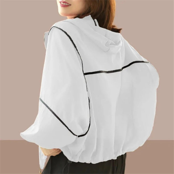 Lightweight women's oversized zip hoodie, a versatile summer jacket for comfortable, trendy layering.