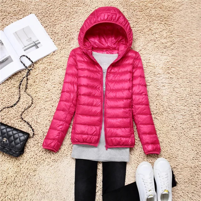 Women's lightweight packable puffer jacket. Ideal for all seasons & travel.