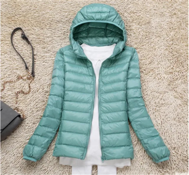 Packable women's puffer coat. Excellent lightweight outerwear for travel & cool days.