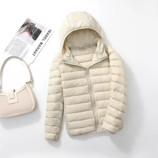 Warm insulated women's puffer coat. Perfect for everyday wear & chilly weather.