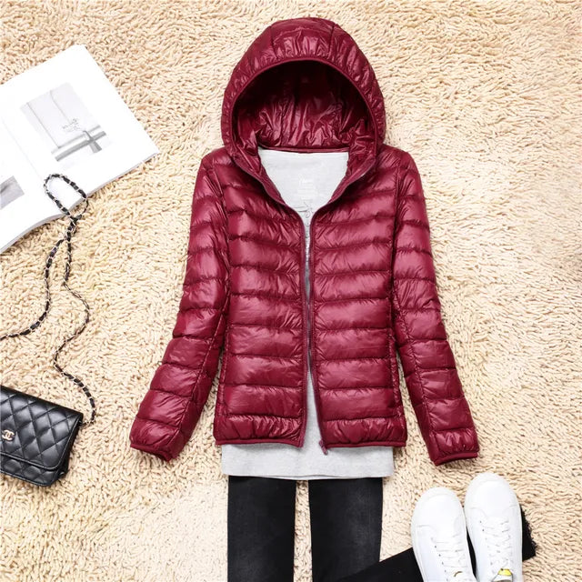 Fashionable women's insulated puffer, perfect for winter & everyday style.