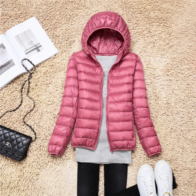 Stylish ladies' lightweight puffer jacket. Ideal for casual wear & easy packing.