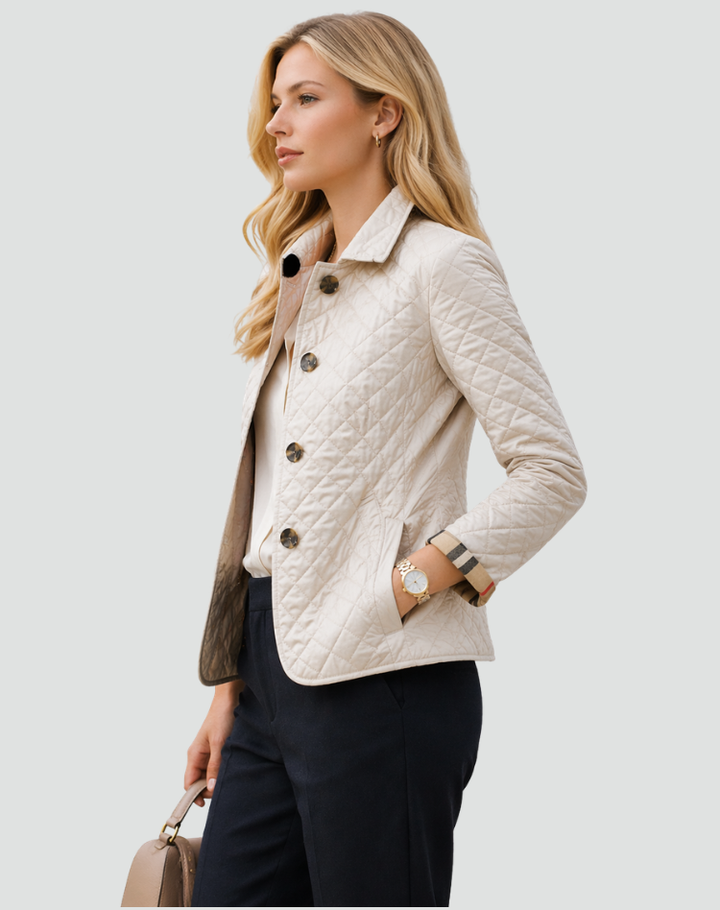 Back view of a women's casual quilted jacket, designed for lightweight comfort and effortless layering.