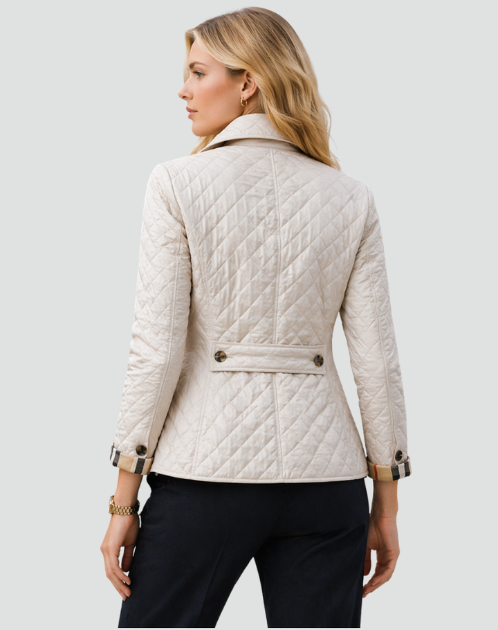 Autumn fashion essential: A women's button-front quilted jacket offering warmth without bulk, a great layering piece.