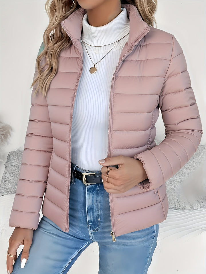 Casual women's zip-up quilted jacket with stand collar, long sleeves, perfect for everyday outerwear.