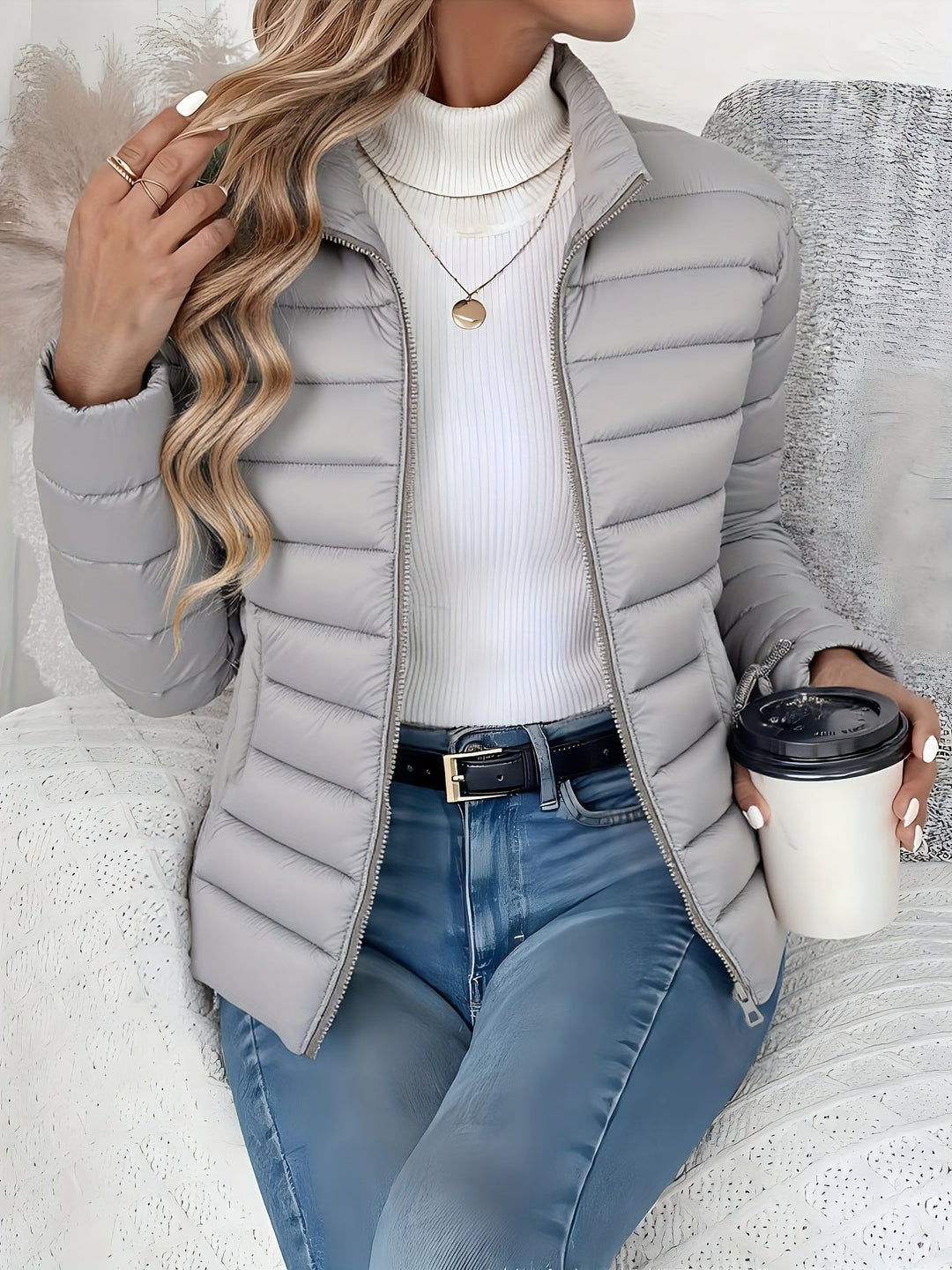 Stylish women's lightweight quilted jacket with stand collar & long sleeves. Perfect for casual fall/winter.