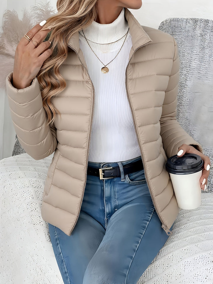 Women's everyday lightweight quilted jacket with a comfortable stand collar and practical zip-up front.