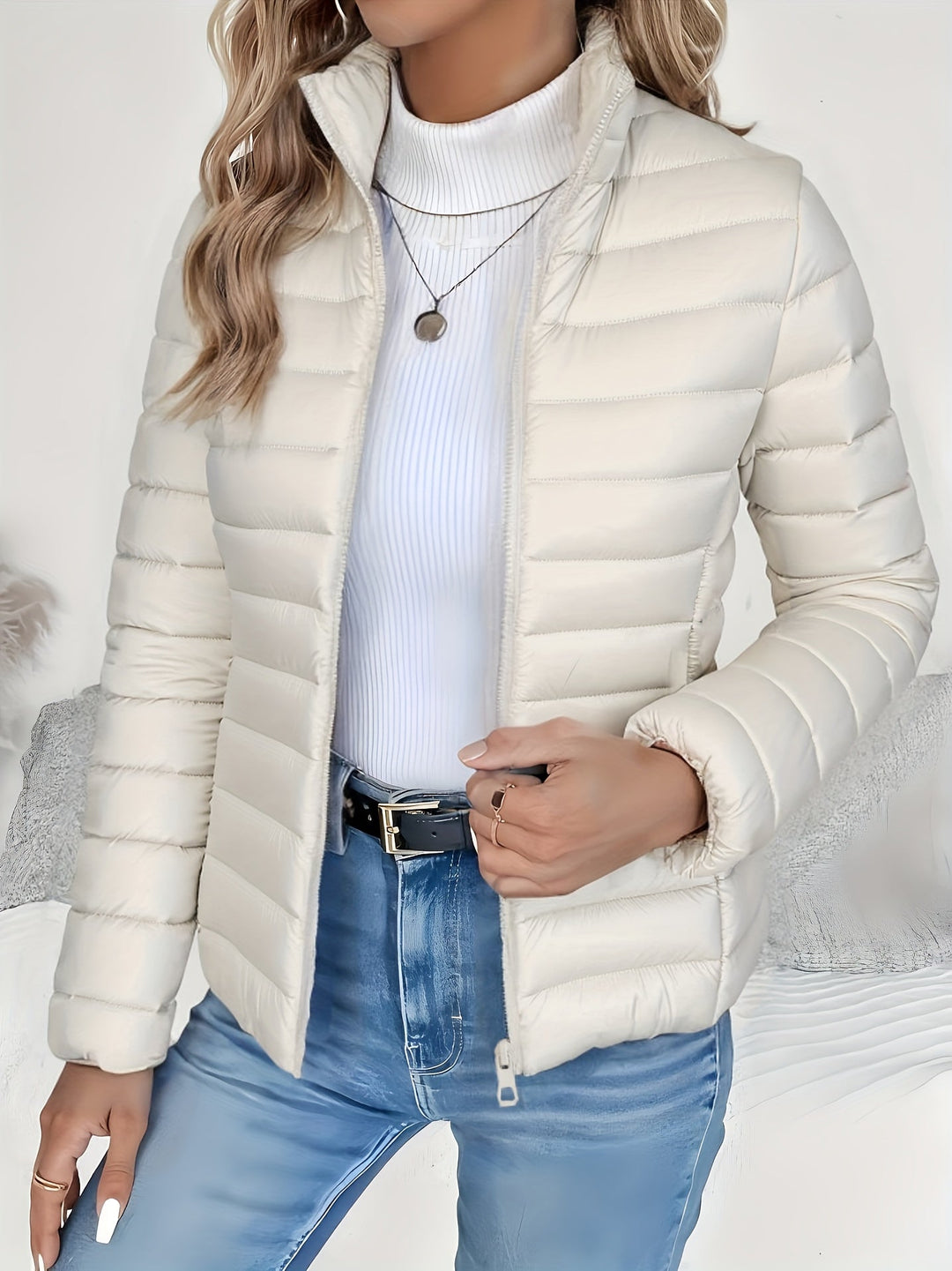 Versatile women's quilted jacket, stand collar, long sleeve design. Excellent lightweight fall/winter outerwear.