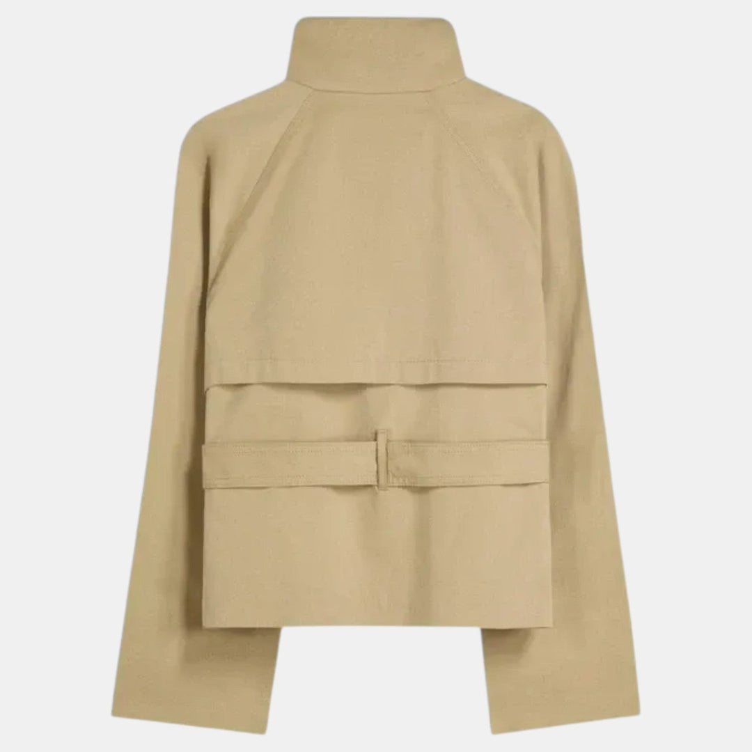 Modern fit women's short trench coat, lightweight & belted, ideal for versatile spring and fall casual outfits.