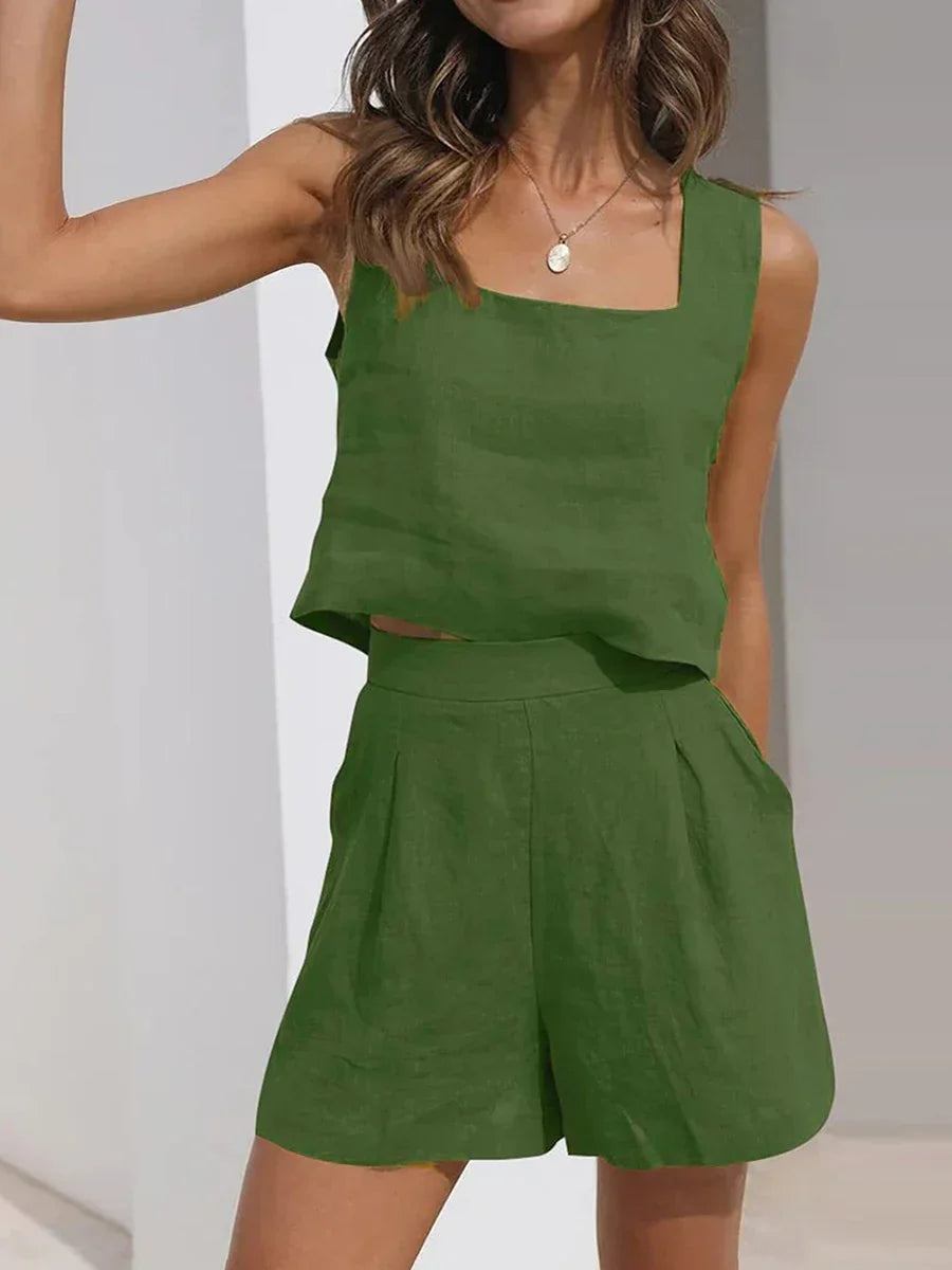 Comfortable women's summer matching set with a sleeveless crop top and high-waisted shorts.