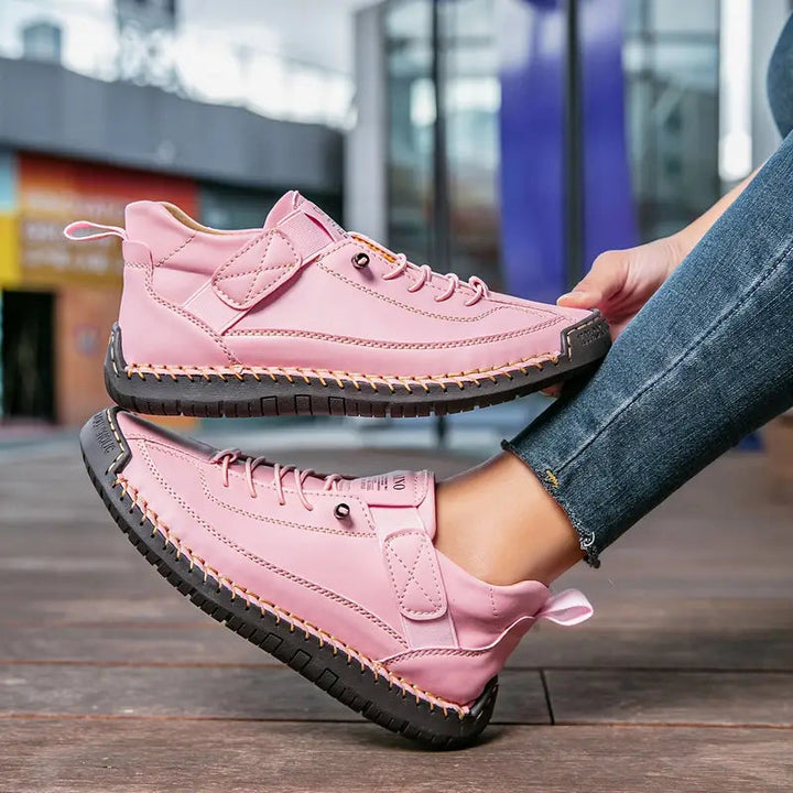 Black women's lightweight slip-on trainers, providing excellent shock absorption and comfort.