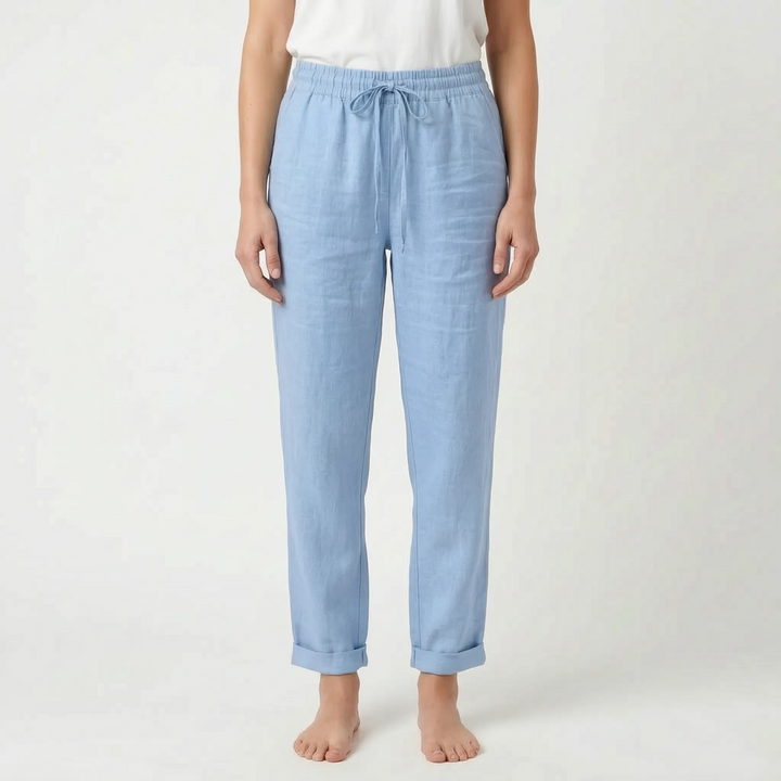 Women's lightweight summer trousers, ankle-length, tapered leg, and drawstring waist for warm-weather apparel.