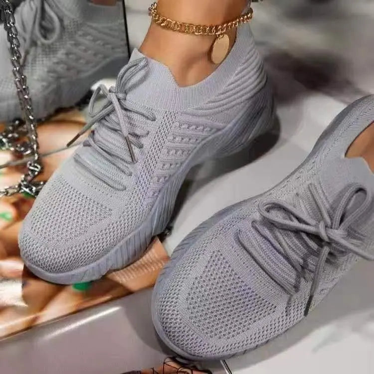 Athletic women's footwear; lightweight, breathable, and non-slip sneakers for walking & casual activities.