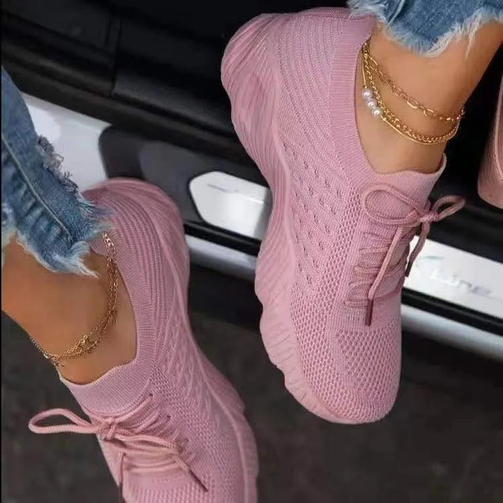 Women's breathable mesh sneakers with a lightweight, non-slip sole; perfect for comfortable everyday walking.