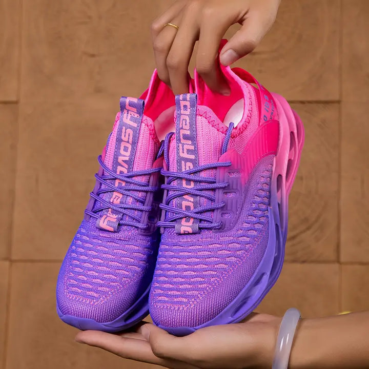 Comfortable women's walking shoes with flexible sole and secure lacing, great for everyday activewear.
