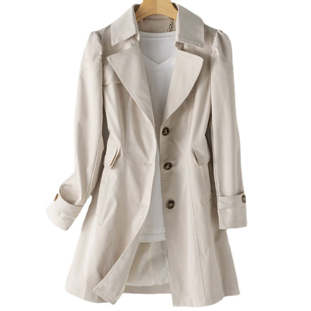 Casual women's hooded windbreaker, rain resistant, with adjustable waist. Ideal for spring/fall weather protection.
