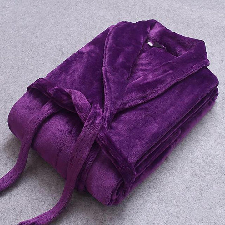 Plush women's lightweight winter robe with a self-tie belt and functional side pockets.