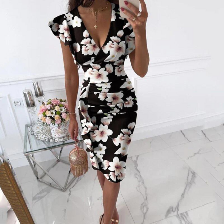 Women's Livia Summer Midi Dress with V-neck and flattering fitted shape. Elegant and comfortable.