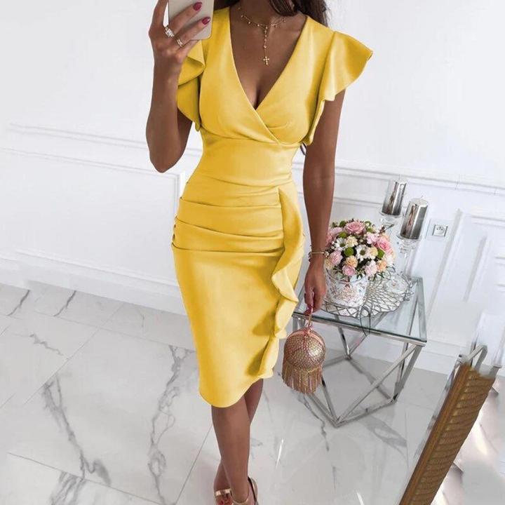 Stylish women's V-neck midi dress for summer. Flattering fitted design, perfect for casual or party wear.