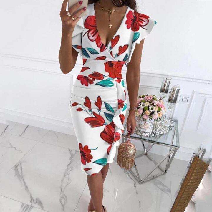 Elegant women's summer midi dress, V-neck, short sleeve. Flattering fit ideal for various occasions.