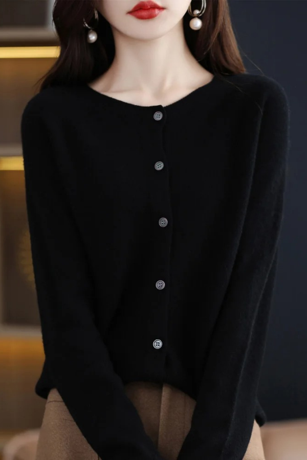 Soft women's long button cardigan, a classic wardrobe staple for versatile fashion & layered looks.