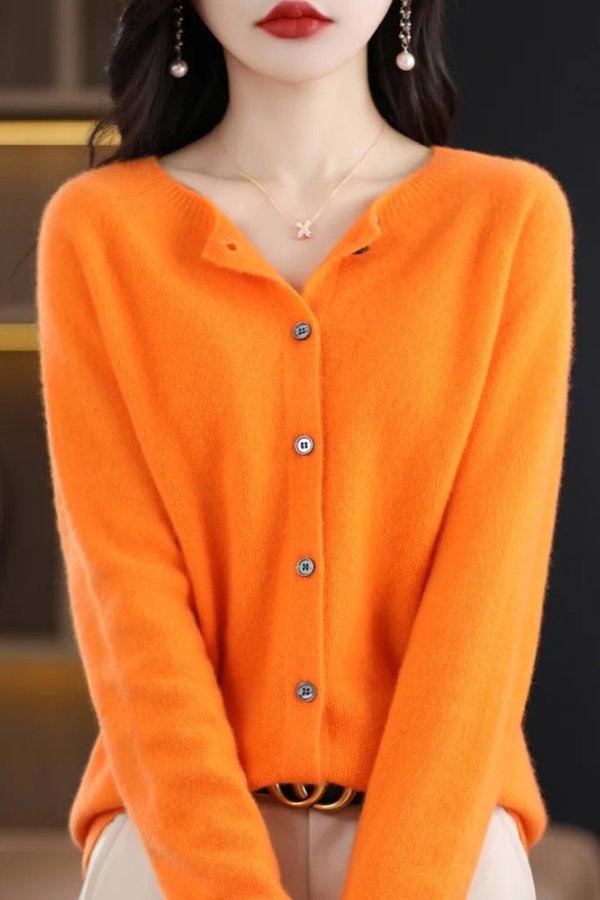 Classic women's long button cardigan, a versatile top for a layered look, casual, or office wear.