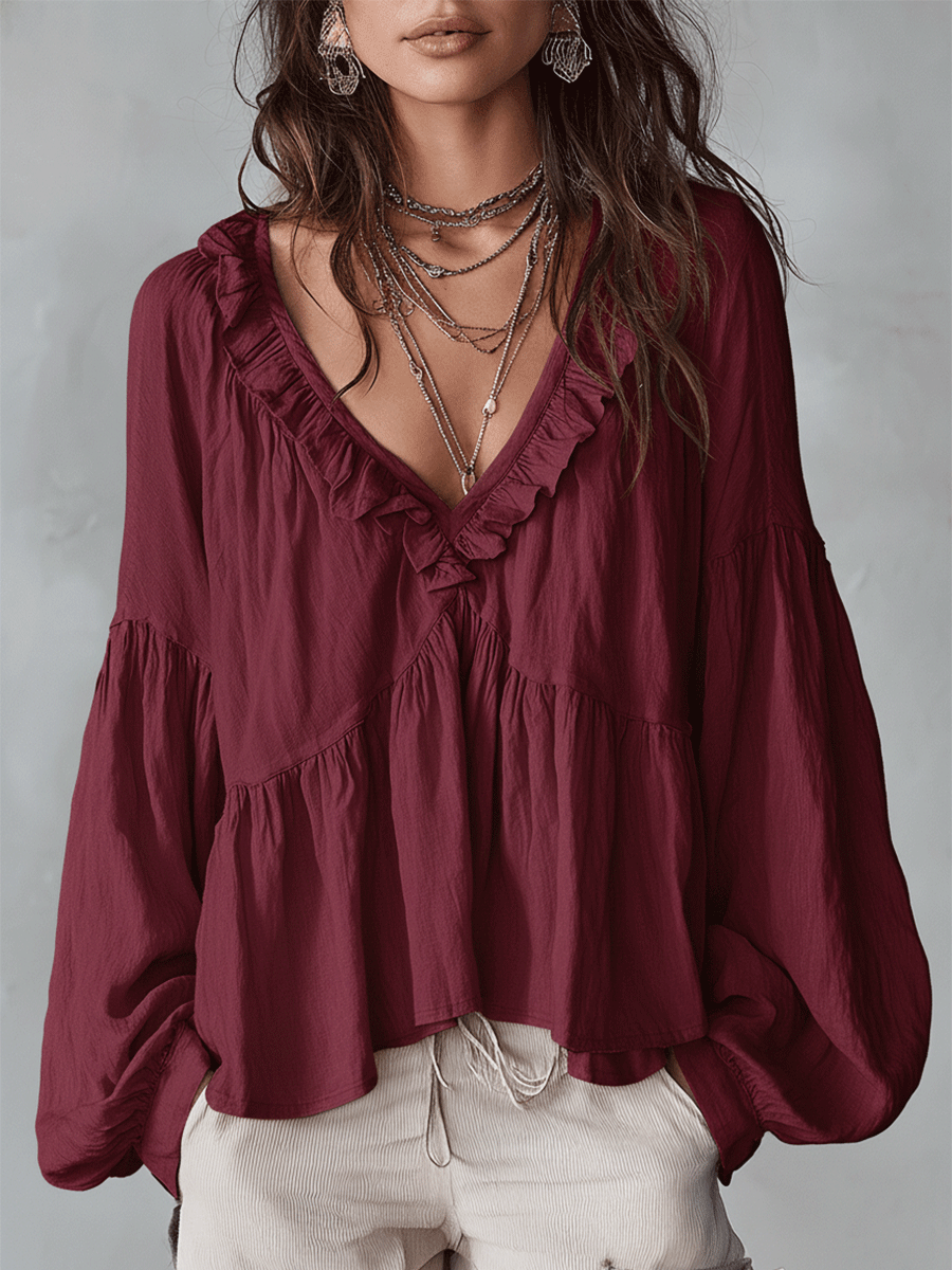 Spring fashion women's bohemian blouse, long sleeve & loose fit. Elegant ruffle top for everyday wear.