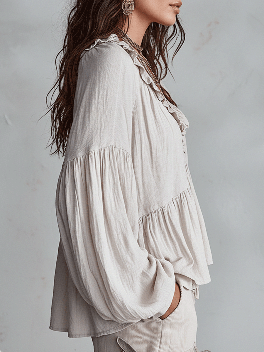 Stylish women's bohemian loose fit blouse. Long sleeve ruffle top, elegant and casual for spring.