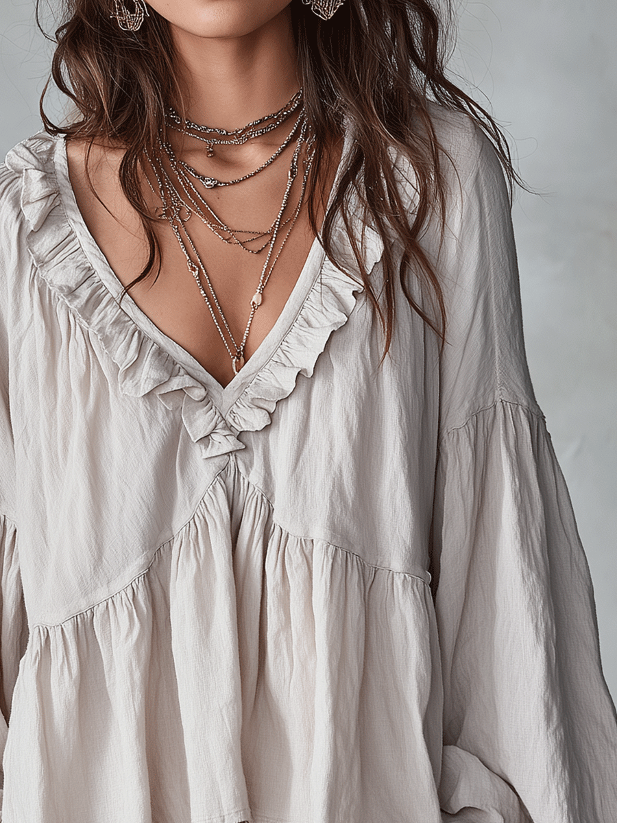 Bohemian long sleeve women's blouse. Loose fit ruffle top, perfect vintage style piece for spring.