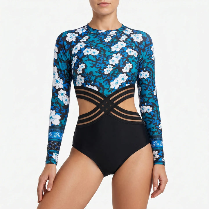 Performance women's long-sleeve swimsuit with strategic cutouts & color block, great for sun-protected active wear.